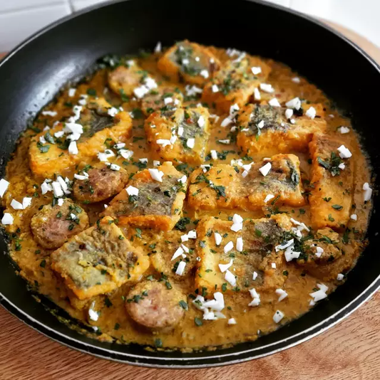 Seehecht- und “Buttifarra” in Mandel-Safran-Sauce